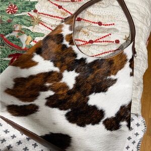 Beautiful brand new cow hide/leather hobo bag